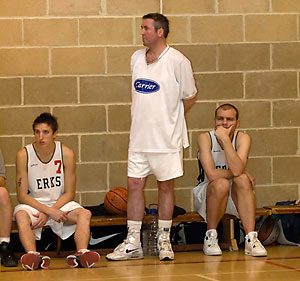 Coach McCusker (standing) is flanked by Robin French (#7) and Lee Atkinson.